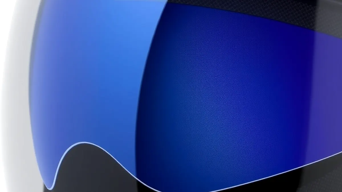 Auto-darkening helmet lens layers